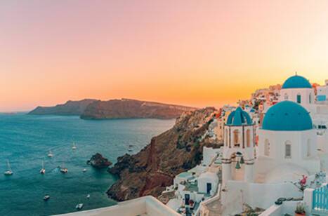 A panoramic view of Oia at sunset