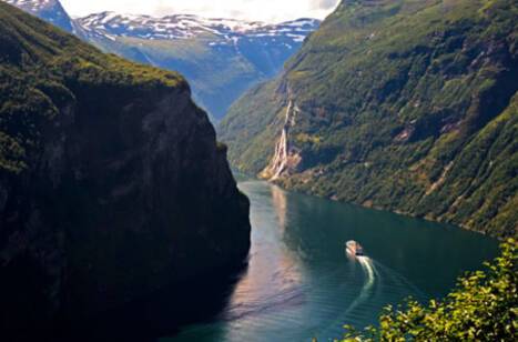 Hurtigruten ship sailing through the Norwegian fjords