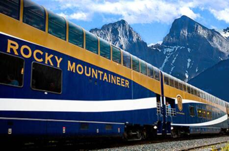 An image of the Rocky Mountaineer train against the backdrop of Canada