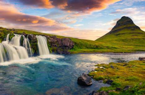 Panoramic image of the famous Kirkjufellsfoss Waterfall and Kirkjufell mountain in the Snaefellsnes peninsula, Iceland