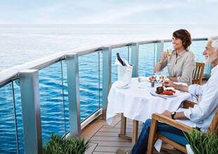Couple dining alfresco on Sky Princess