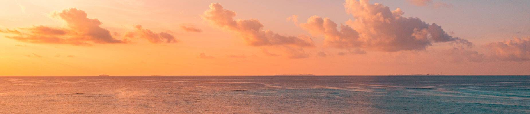 A panoramic image of the horizon at sunset