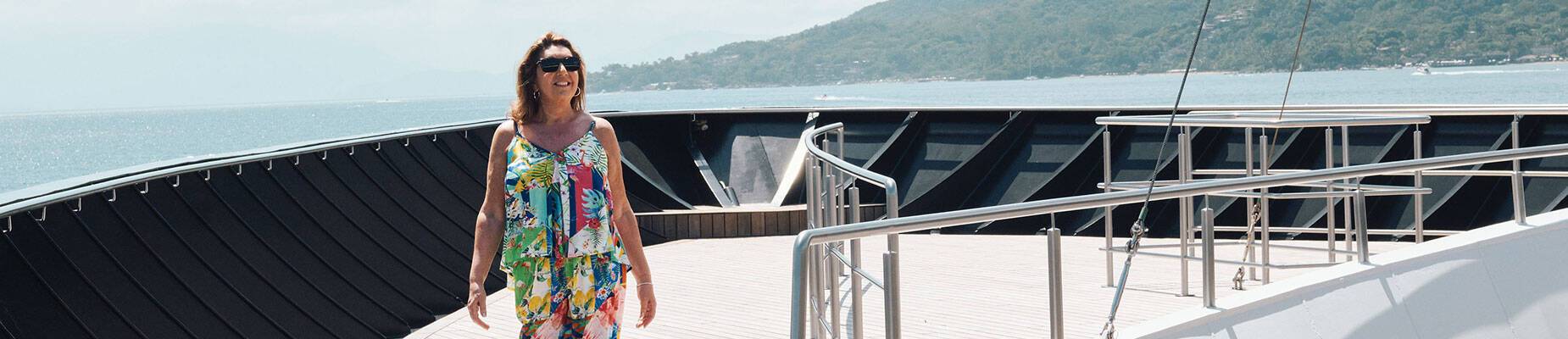 Jane McDonald on the deck of a cruise ship