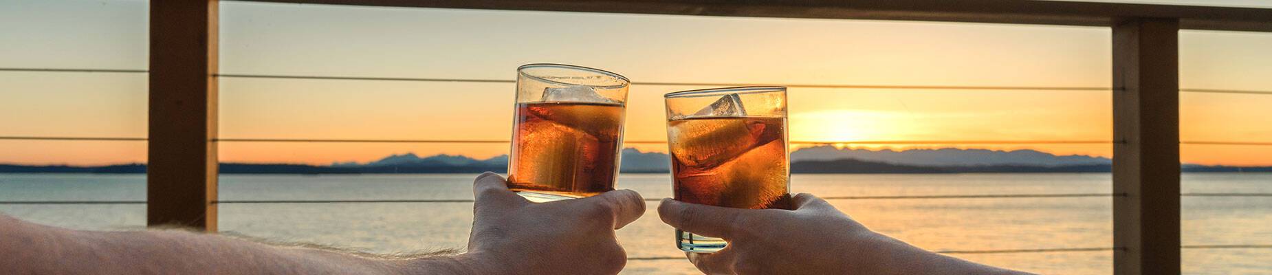 Two arms with two glasses