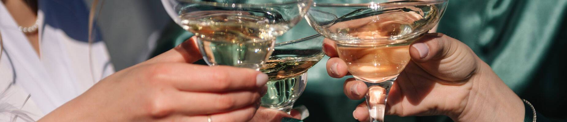 Friends holding cocktails