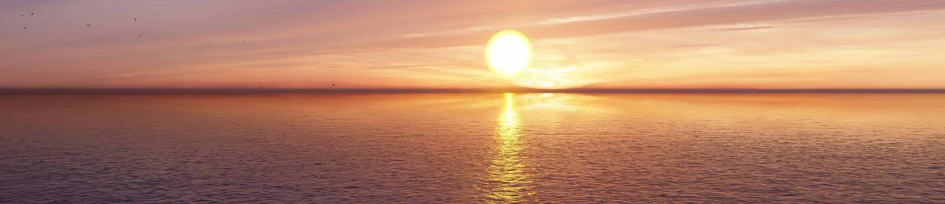 Panoramic image of the sunset at sea