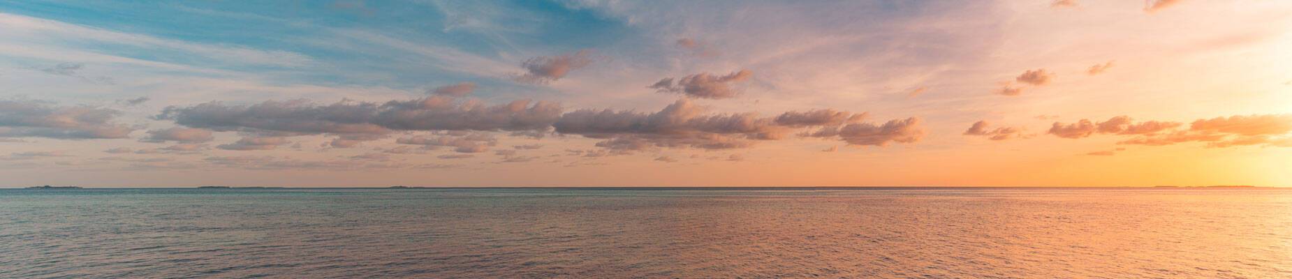 Panoramic image of sunrise at sea