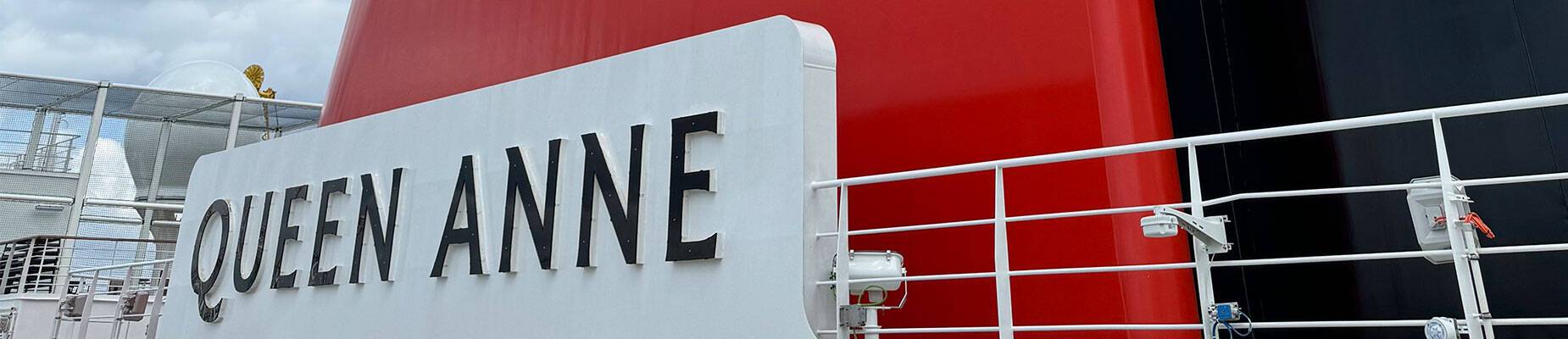 The sign and red funnel on Queen Anne