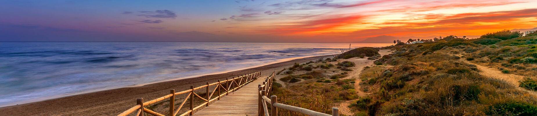 View of a beach in Spain at sunset