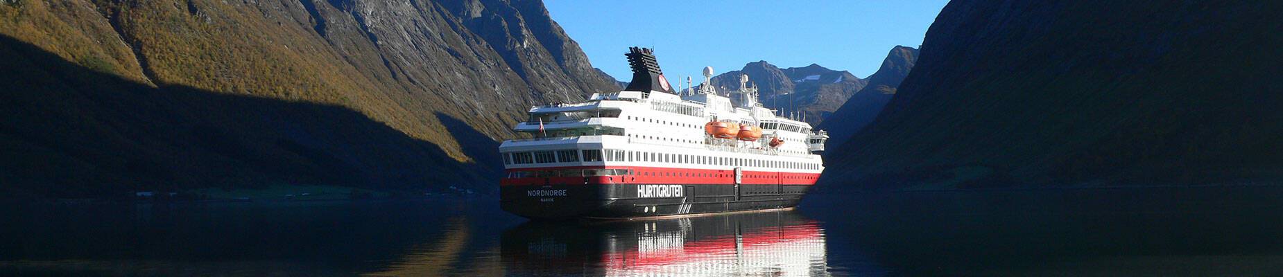 A cruise ship in a Norwegian fjord