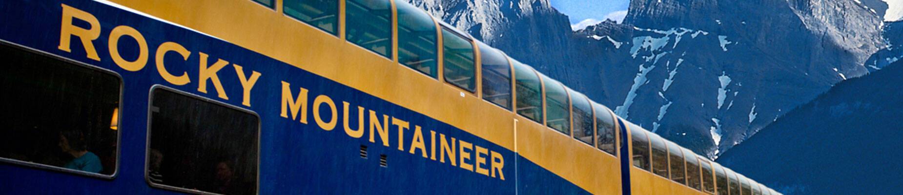 An image of the Rocky Mountaineer train against the backdrop of Canada