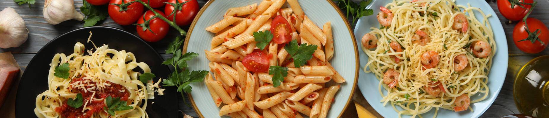 Three bowls of freshly made pasta