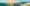 A panoramic view of the sun rising over the Great Wall of China