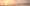 Panoramic image of the sun setting over the horizon
