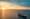 Panoramic image of Borealis at sea during sunset