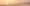 A panoramic image of a beach at sunset