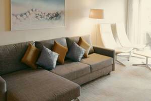 De Luxe Suite Living Area. Ambition, Ambassador Cruise Line