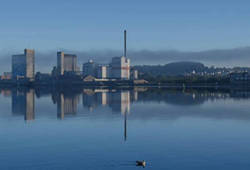 A panoramic view of a misty Aalborg