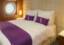 Deluxe Suite Bedroom, Ambition, Ambassador Cruise Line