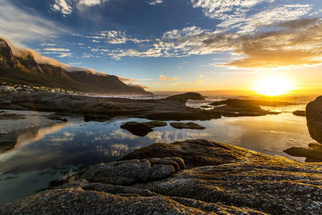 The sun setting over Camps Bay in South Africa