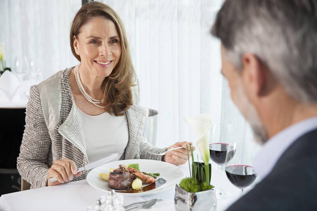 Emerald Waterways- Couple having a romantic luxury meal