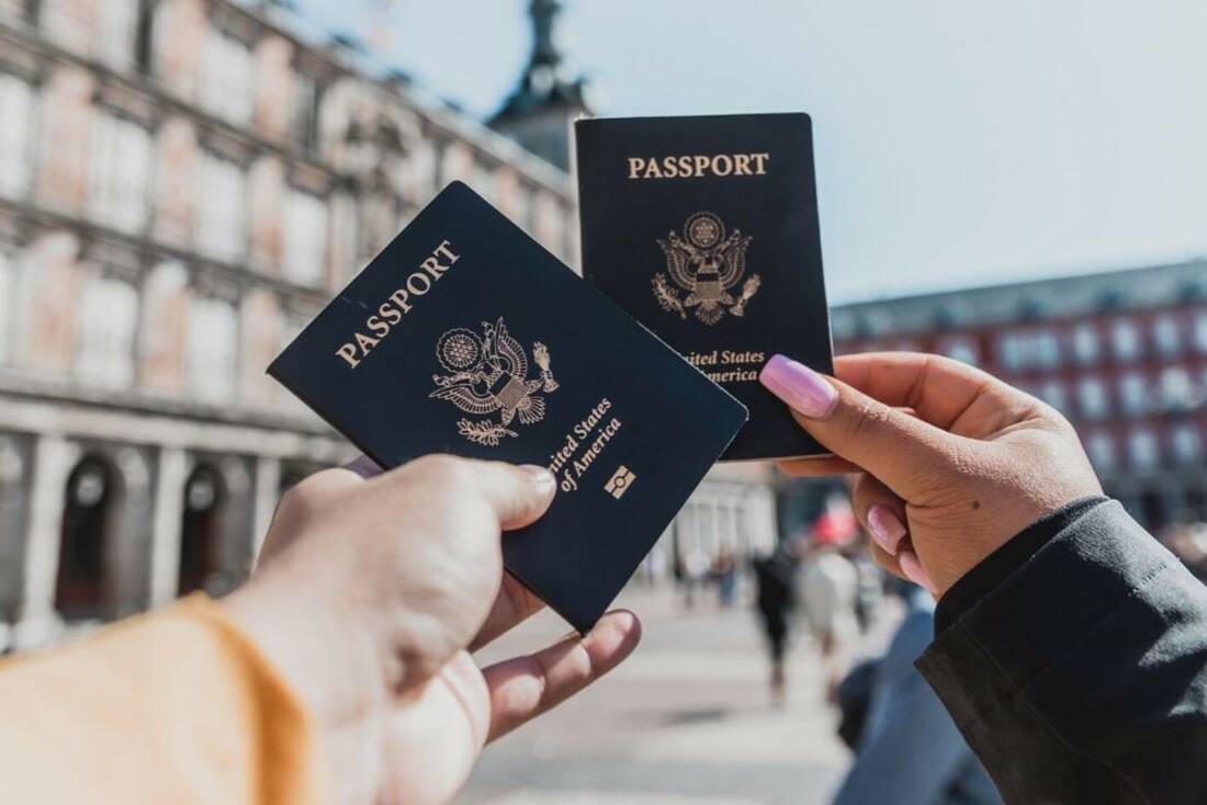 Holding passports on holiday