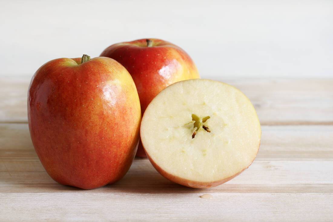 Studying the core of an apple on new Year's Eve in the Czech Republic