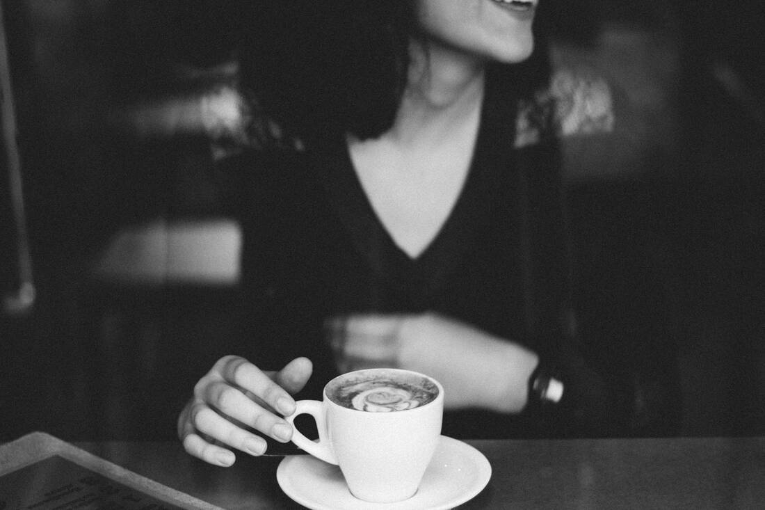 woman drinking coffee
