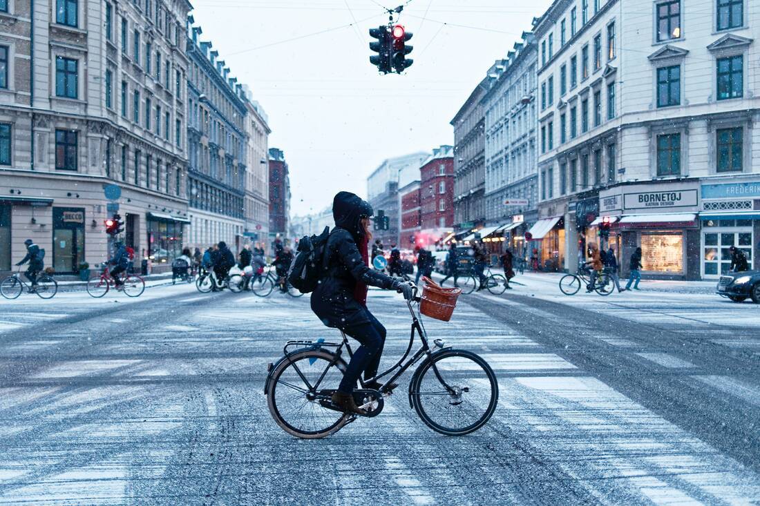 Person cycling in the snow in Copenhagen