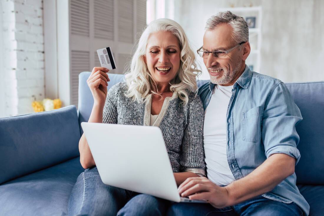 Couple using a laptop