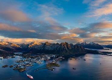 The sun rising over Svolvær