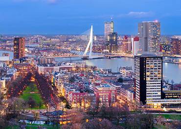 An aerial view of Rotterdam at dusk