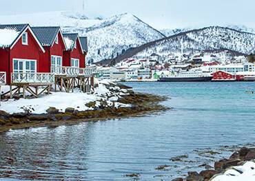 A panoramic view of snowy Stokmarknes