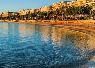 A panoramic view of Cannes at sunset