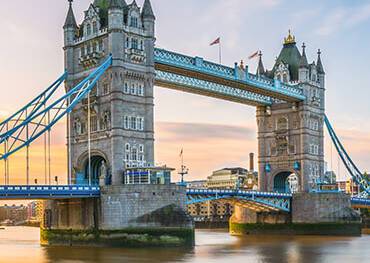 A panoramic view of Tower Bridge at sunrise