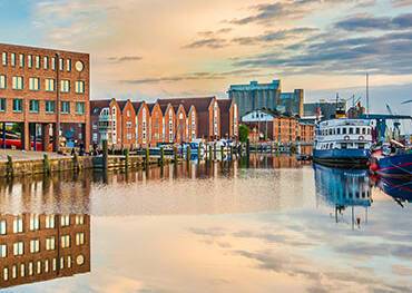 Kiel's cityscape reflected in water