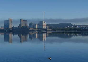 A panoramic view of a misty Aalborg