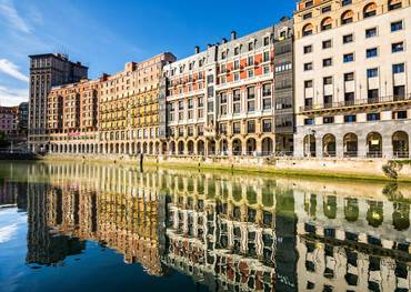 reflections at downtown bilbao facades