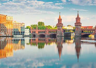 Berlin cityscape reflected in water