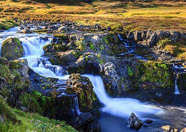 A picturesque waterfall close to Seydisfjordur