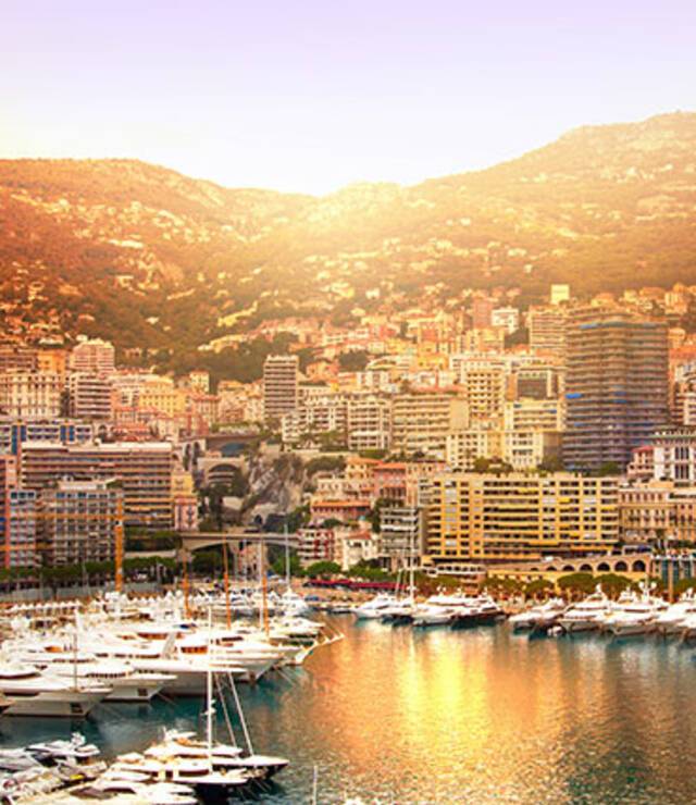 The sun setting over Monte Carlo's harbour
