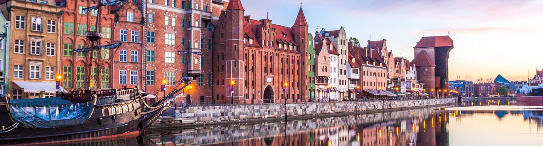 The cityscape of Gdansk reflected in the water