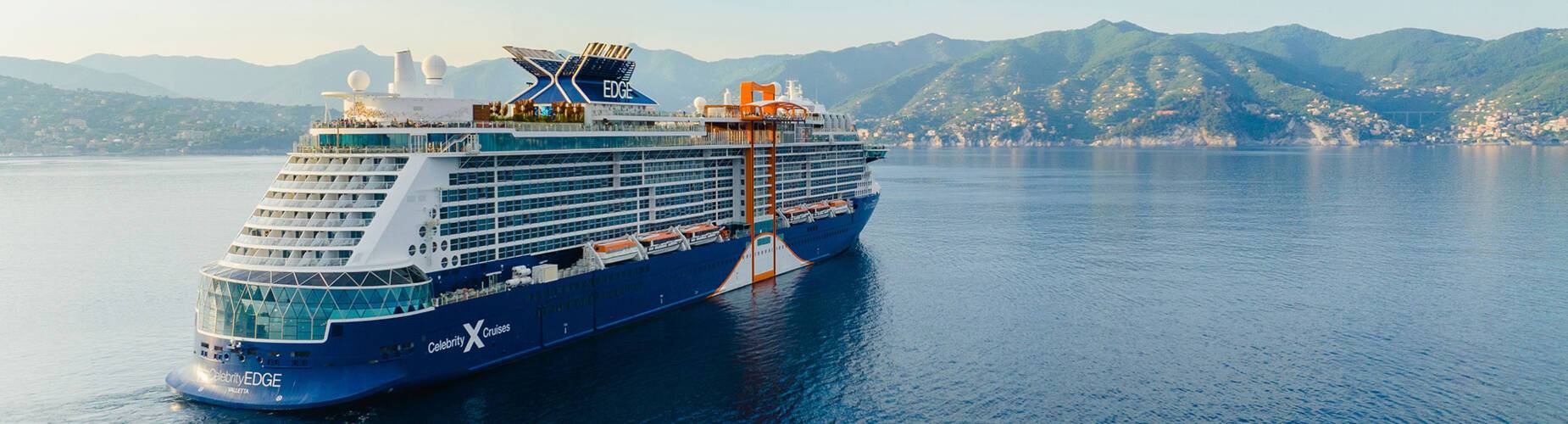 A cruise ship sailing towards Portofino