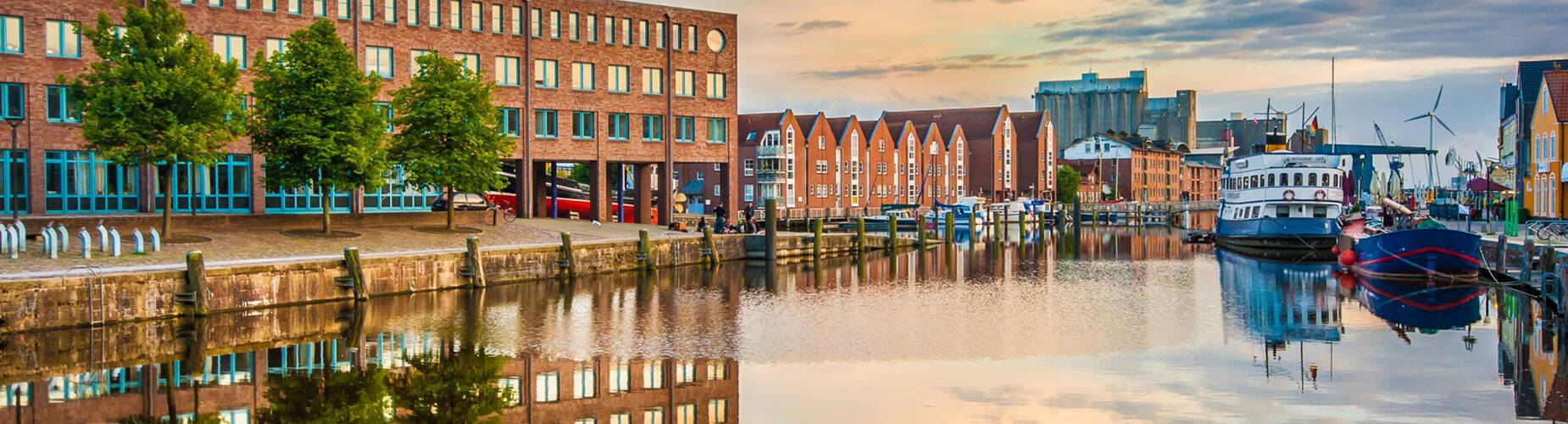 Kiel's cityscape reflected in water