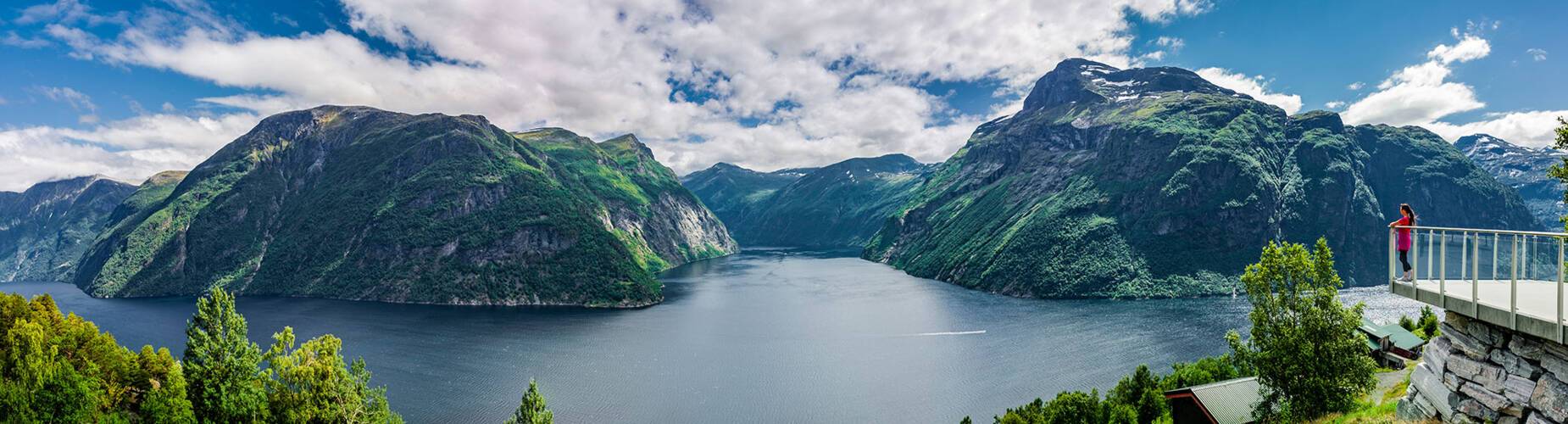 Girl looking out at a fjord from Hellesylt's lookout