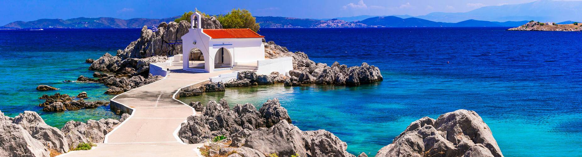 A church on the waters edge in Chios