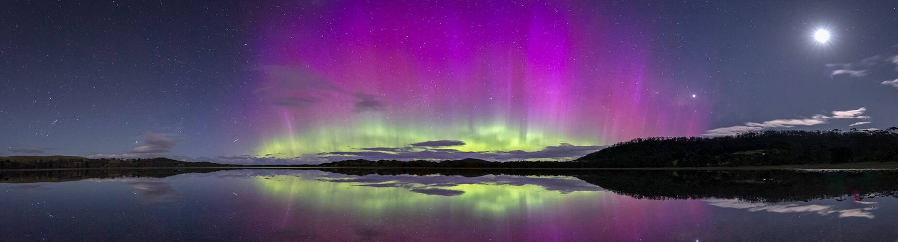 Southern Lights reflected in the water