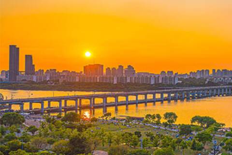 The sun setting over Seoul