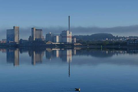A panoramic view of a misty Aalborg