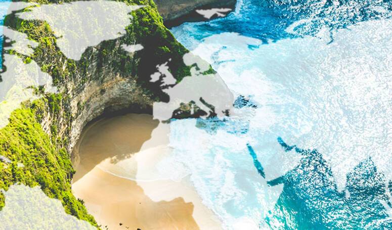 Balinese beach with a world map